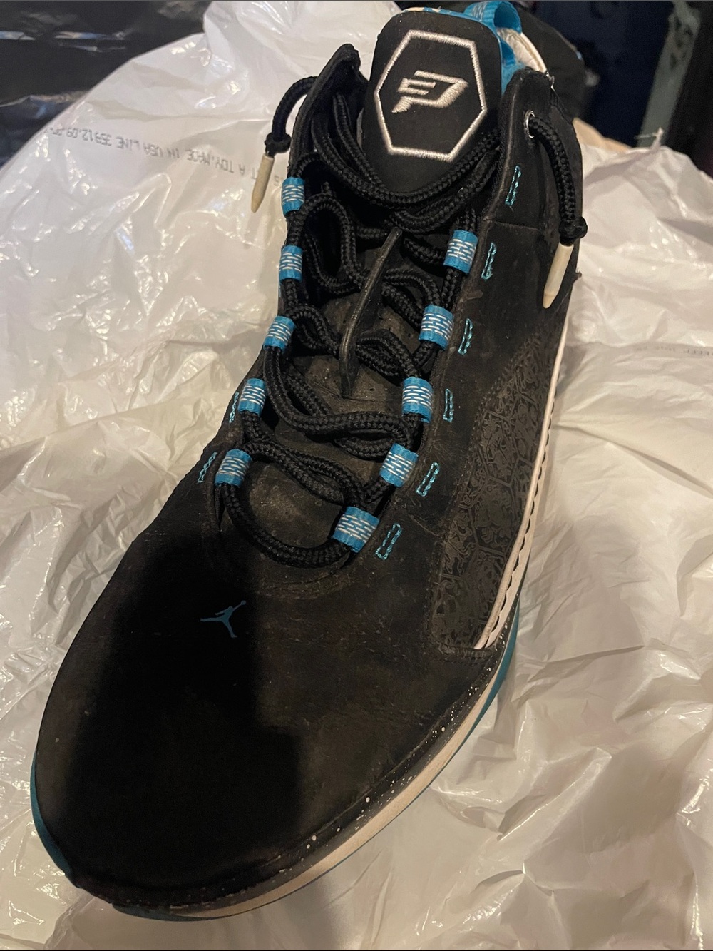 Jordan Men’s Black and Teal Low-Top Basketball Shoe
